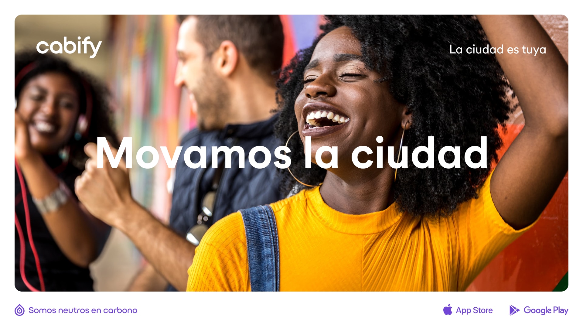 Un anuncio con la imagen de una mujer contenta y el texto "Movamos la ciudad"