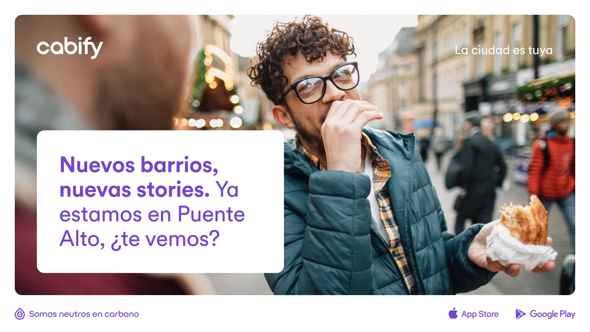 Un anuncio con el texto "Nuevos barrios, nuevas stories. ya estamos en Puente Alto, ¿te vemos? y la foto de fondo de un chico comiendo comida en la calle