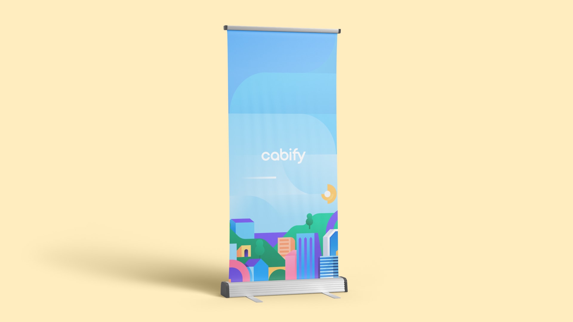 Un roll up con la ilustración de una ciudad y el logo de Cabify